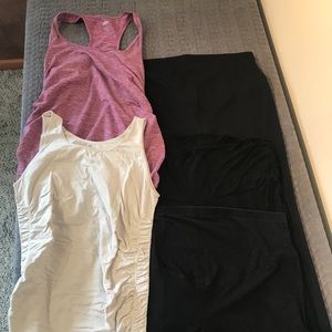 Two maternity tank tops and three workout pants